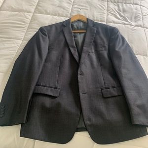 shark skin charcoal grey 3 piece suit. Worn twice, last time 4 years ago.